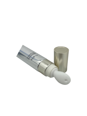 Customized Lotion Squeeze Tube Eye Cream Massage Packaging Cosmetic Plastic Soft Tube with Massage Applicator Zinc Alloy